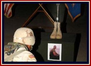 A soldier from 2nd Battalion, 3rd Avaition Regiment mourns following a memorial ceremony for six fellow soldiers who were killed in a Blackhawk helicopter, April 2. Photo by David K. Dismukes.